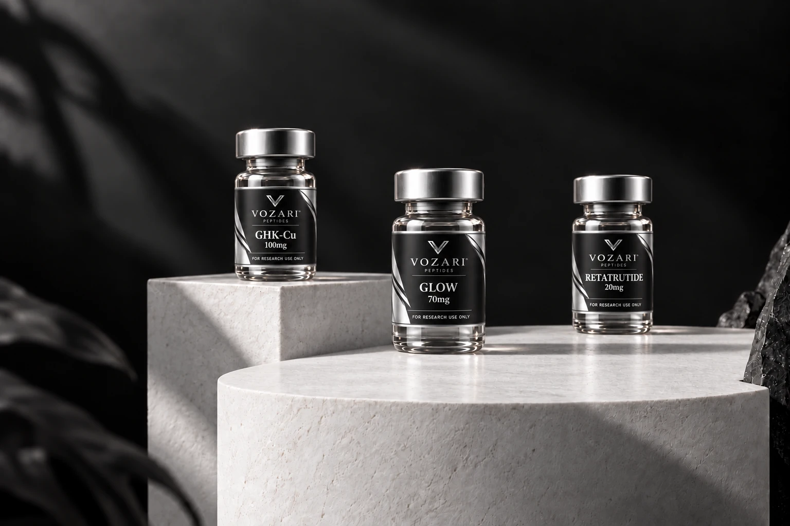 Vozari vial packaging mockups with black and chrome labels